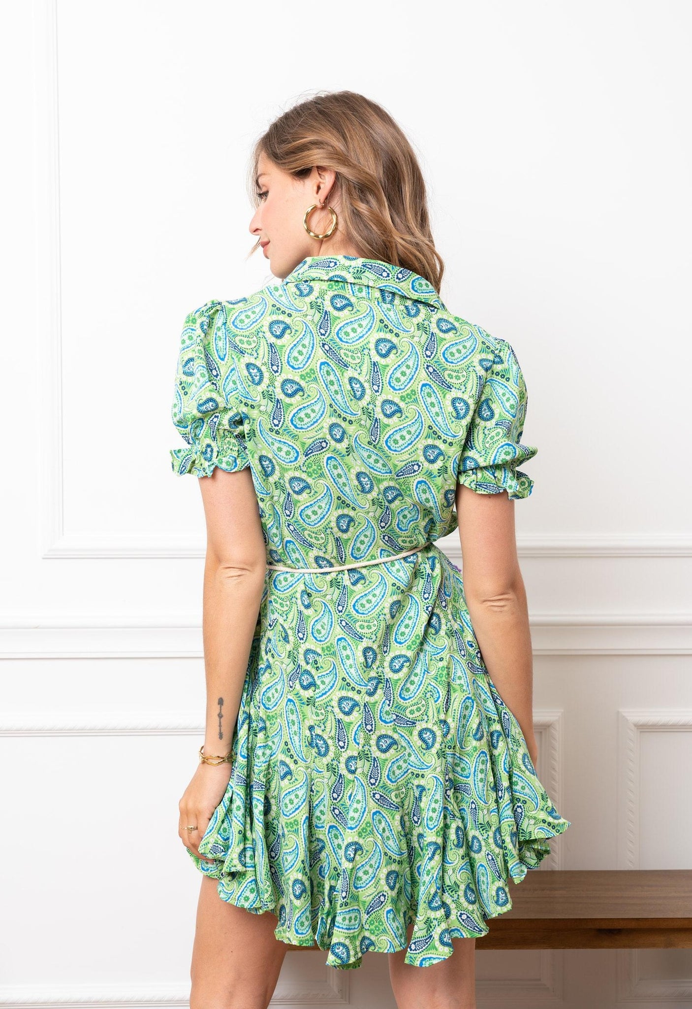 Green printed belted dress.