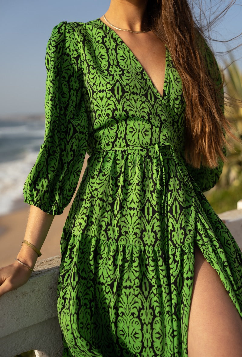 Green graphic wrap dress
